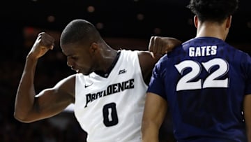 Jan 26, 2016; Providence, RI, USA; Providence Friars forward Ben Bentil (0) celebrates against Xavier Musketeers forward Kaiser Gates (22) during the first half at Dunkin Donuts Center. Mandatory Credit: Mark L. Baer-USA TODAY Sports