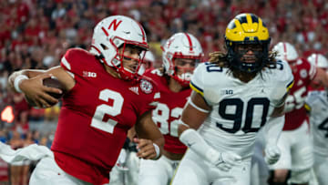 Nebraska Cornhuskers quarterback Adrian Martinez runs the ball against the Michigan Wolverines ( Dylan Widger-USA TODAY Sports)