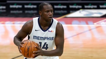 CHARLOTTE, NORTH CAROLINA - JANUARY 01: Gorgui Dieng #14 of the Memphis Grizzlies looks over the court during the fourth quarter of their game against the Charlotte Hornets at Spectrum Center on January 01, 2021 in Charlotte, North Carolina. NOTE TO USER: User expressly acknowledges and agrees that, by downloading and or using this photograph, User is consenting to the terms and conditions of the Getty Images License Agreement. (Photo by Jared C. Tilton/ Getty Images)