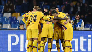 NAPLES, ITALY - FEBRUARY 25: FC Barcelona players celebrate the 1-1 goal scored by Antoine Griezmann during the UEFA Champions League round of 16 first leg match between SSC Napoli and FC Barcelona at Stadio San Paolo on February 25, 2020 in Naples, Italy. (Photo by Francesco Pecoraro/Getty Images)