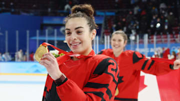 BEIJING, CHINA - FEBRUARY 17: Sarah Nurse #20 of Team Canada poses for photos with the gold medal won by defeating Team United States in the Women's Ice Hockey Gold Medal match between Team Canada and Team United States on Day 13 of the Beijing 2022 Winter Olympic Games at Wukesong Sports Centre on February 17, 2022 in Beijing, China. (Photo by Bruce Bennett/Getty Images)