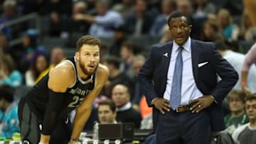CHARLOTTE, NC - DECEMBER 12: Blake Griffin #23 of the Detroit Pistons talks to head coach Dwane Casey during their game against the Charlotte Hornets at Spectrum Center on December 12, 2018 in Charlotte, North Carolina. NOTE TO USER: User expressly acknowledges and agrees that, by downloading and or using this photograph, User is consenting to the terms and conditions of the Getty Images License Agreement. (Photo by Streeter Lecka/Getty Images)