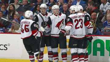 VANCOUVER, BC - APRIL 5: Christian Fischer #36 of the Arizona Coyotes is congratulated by teammates after scoring during their NHL game against the Vancouver Canucks at Rogers Arena April 5, 2018 in Vancouver, British Columbia, Canada. (Photo by Jeff Vinnick/NHLI via Getty Images)