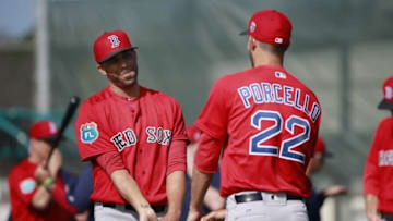 Feb 20, 2016; Lee County, FL, USA; Boston Red Sox starting pitcher David Price (24) and starting pitcher Rick Porcello (22) stretch as they work out at Jet Blue Park. Mandatory Credit: Kim Klement-USA TODAY Sports