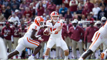Clemson football Trevor Lawrence, Travis Etienne