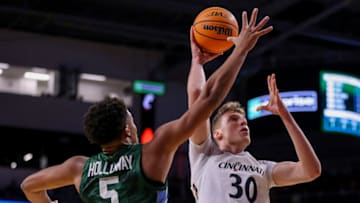 Cincinnati Bearcats forward Viktor Lakhin shoots against Tulane Green Wave at Fifth Third Arena. USA Today.