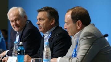 SOCHI, RUSSIA - FEBRUARY 18: (L-R) Executive Director of the National Hockey League Players Associatio Donald Fehr, International Ice Hockey Federation President Rene Fasel and National Hockey League Commissioner Gary Bettman speak during a press conference on day eleven of the Sochi 2014 Winter Olympics on February 18, 2014 in Sochi, Russia. (Photo by Bruce Bennett/Getty Images)