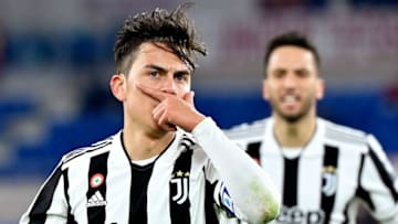 Juventus' Argentine forward Paulo Dybala celebrates after scoring his team's first goal during the Serie A football match beetween AS Roma and Juventus at the Olympic stadium in Rome on January 9, 2022. (Photo by Alberto PIZZOLI / AFP) (Photo by ALBERTO PIZZOLI/AFP via Getty Images)