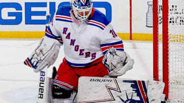 NEWARK, NJ - APRIL 01: Henrik Lundqvist #30 of the New York Rangers defends his net against the New Jersey Devils during the game at Prudential Center on April 1, 2019 in Newark, New Jersey. (Photo by Andy Marlin/NHLI via Getty Images)