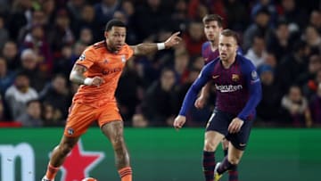 (l-r) Memphis Depay of Olympique Lyonnais, Arthur Henrique Ramos de Oliveira Melo, formally of FC Barcelona.(Photo by VI Images via Getty Images)