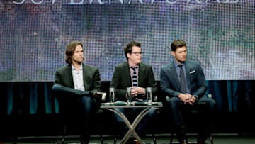 BEVERLY HILLS, CA - JULY 18: (L-R) Actor Jared Padalecki, producer Jeremy Carver, and actor Jensen Ackles speak onstage at the "Supernatural" panel during the CW Network portion of the 2014 Summer Television Critics Association at The Beverly Hilton Hotel on July 18, 2014 in Beverly Hills, California. (Photo by Frederick M. Brown/Getty Images)