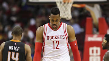 Apr 7, 2016; Houston, TX, USA; Houston Rockets center Dwight Howard (12) reacts after a play in the first half against the Phoenix Suns at Toyota Center. The Suns won 124-115. Mandatory Credit: Troy Taormina-USA TODAY Sports