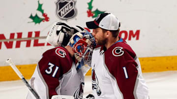 SUNRISE, FL - DECEMBER 6: Fellow Goaltenders Philipp Grubauer #31 and Semyon Varlamov #1 of the Colorado Avalanche celebrate their 5-2 win over the Florida Panthers at the BB&T Center on December 6, 2018 in Sunrise, Florida. (Photo by Eliot J. Schechter/NHLI via Getty Images)