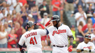 CLEVELAND, OHIO - AUGUST 12: Carlos Santana #41 of the Cleveland Indians celebrates with Franmil Reyes #32 after both scored on Reyes' home run in the first inning against the Boston Red Sox at Progressive Field on August 12, 2019 in Cleveland, Ohio. (Photo by Jason Miller/Getty Images)