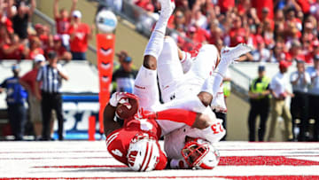 MADISON, WI - SEPTEMBER 08: A.J. Taylor #4 of the Wisconsin Badgers catches a pass for a touchdown in front of Marcus Hayes #23 of the New Mexico Lobos during the second half of a game at Camp Randall Stadium on September 8, 2018 in Madison, Wisconsin. (Photo by Stacy Revere/Getty Images)