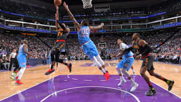 SACRAMENTO, CA - FEBRUARY 10: Kent Bazemore #24 of the Atlanta Hawks shoots against Willie Cauley-Stein #00 of the Sacramento Kings on February 10, 2017 at Golden 1 Center in Sacramento, California. NOTE TO USER: User expressly acknowledges and agrees that, by downloading and or using this photograph, User is consenting to the terms and conditions of the Getty Images Agreement. Mandatory Copyright Notice: Copyright 2017 NBAE (Photo by Rocky Widner/NBAE via Getty Images)