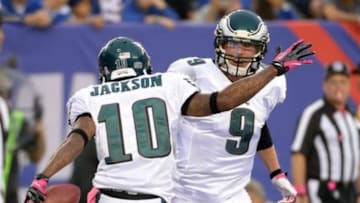 Oct 6, 2013; East Rutherford, NJ, USA; Philadelphia Eagles wide receiver DeSean Jackson (10) celebrates with quarterback Nick Foles (9) after a touchdown in the fourth quarter against the New York Giants during the game at MetLife Stadium. Mandatory Credit: Robert Deutsch-USA TODAY Sports