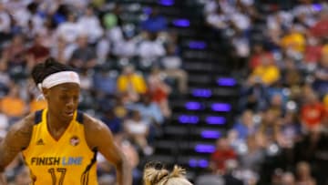 INDIANAPOLIS, IN July 14 2017: Washington Mystics forward Elena Delle Donne (11) grimaces in pain as she goes down with an injury during the game between the Washington Mystics and Indiana Fever July 14, 2017, at Bankers Life Fieldhouse in Indianapolis, IN. (Photo by Jeffrey Brown/Icon Sportswire via Getty Images)