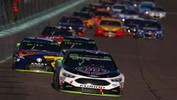 HOMESTEAD, FL - NOVEMBER 19: Kevin Harvick, driver of the #4 Jimmy John's Ford, leads Kyle Busch, driver of the #18 M&M's Caramel Toyota, and Martin Truex Jr., driver of the #78 Bass Pro Shops/Tracker Boats Toyota, during the Monster Energy NASCAR Cup Series Championship Ford EcoBoost 400 at Homestead-Miami Speedway on November 19, 2017 in Homestead, Florida. (Photo by Sarah Crabill/Getty Images)