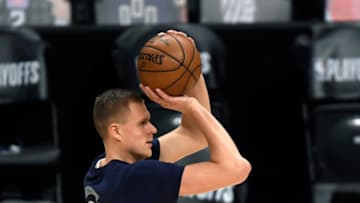 LOS ANGELES, CA - JUNE 06: Kristaps Porzingis #6 of the Dallas Mavericks shoots during pre game warm ups during Game Seven of the Western Conference first round series against the Los Angeles Clippers at Staples Center on June 6, 2021 in Los Angeles, California. NOTE TO USER: User expressly acknowledges and agrees that, by downloading and or using this photograph, User is consenting to the terms and conditions of the Getty Images License Agreement. (Photo by Kevork Djansezian/Getty Images)