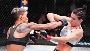 LAS VEGAS, NEVADA - NOVEMBER 05: (L-R) Amanda Lemos of Brazil punches Marina Rodriguez of Brazil in a strawweight fight during the UFC Fight Night event at UFC APEX on November 05, 2022 in Las Vegas, Nevada. (Photo by Chris Unger/Zuffa LLC)