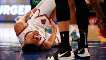NEW YORK, NY - OCTOBER 20: Kevin Knox #20 of the New York Knicks reacts after being injured during the first quarter against the Boston Celtics at Madison Square Garden on October 20, 2018 in New York City. (Photo by Mike Stobe/Getty Images)