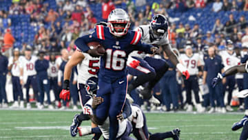 Aug 10, 2023; Foxborough, Massachusetts, USA; New England Patriots quarterback Malik Cunningham (16) fights his way into the endzone for a touchdown against the Houston Texans during the second half at Gillette Stadium. Mandatory Credit: Eric Canha-USA TODAY Sports