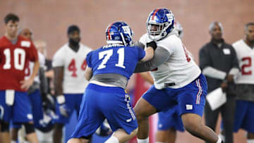 Jun 16, 2015; East Rutherford, NJ, USA; New York Giants guard Bobby Hart (68) blocks defensive end Brad Harrah (71) during minicamp at Quest Diagnostics Training Center. Mandatory Credit: Steven Ryan-USA TODAY Sports