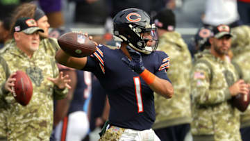 CHICAGO, ILLINOIS - NOVEMBER 21: Justin Fields #1 of the Chicago Bears warms up before the game against the Baltimore Ravens at Soldier Field on November 21, 2021 in Chicago, Illinois. (Photo by Jonathan Daniel/Getty Images)