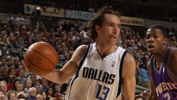 DALLAS - MARCH 22: Steve Nash #13 of the Dallas Mavericks drives around Joe Johnson #2 of the Phoenix Suns during the game at American Airlines Center on March 22, 2003 in Dallas, Texas. The Mavericks won 102-95. NOTE TO USER: User expressly acknowledges and agrees that, by downloading and/or using this Photograph, User is consenting to the terms and conditions of the Getty Images License Agreement Mandatory Copyright Notice: Copyright 2003 NBAE (Photo by Glenn James/NBAE/Getty Images)