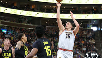 Apr 8, 2023; Salt Lake City, Utah, USA; Denver Nuggets center Nikola Jokic (15) shoots the ball against the Utah Jazz in the first quarter at Vivint Arena. Mandatory Credit: Rob Gray-USA TODAY Sports
