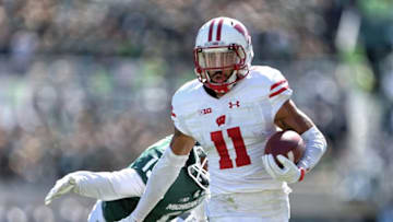 Sep 24, 2016; East Lansing, MI, USA; Wisconsin Badgers wide receiver Jazz Peavy (11) runs for yards after a catch against the Michigan State Spartans during the first half of a game at Spartan Stadium. Mandatory Credit: Mike Carter-USA TODAY Sports