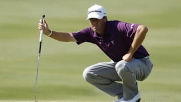 May 19, 2012; Irving, TX, USA; Ryan Palmer lines up his putt on the eighteenth green during the third round of the HP Byron Nelson Classic at the TPC Four Seasons Resort - Las Colinas. Mandatory Credit: Jim Cowsert-USA TODAY Sports