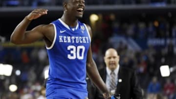 Apr 5, 2014; Arlington, TX, USA; Kentucky Wildcats forward Julius Randle (30) celebrates after defeating the Wisconsin Badgers in the semifinals of the Final Four in the 2014 NCAA Mens Division I Championship tournament at AT&T Stadium. Mandatory Credit: Robert Deutsch-USA TODAY Sports