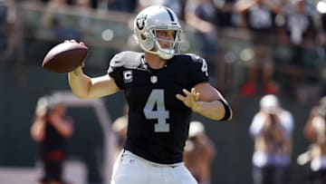 Sep 18, 2016; Oakland, CA, USA; Oakland Raiders quarterback Derek Carr (4) prepares to throw a pass against the Atlanta Falcons in the first quarter at Oakland-Alameda County Coliseum. Mandatory Credit: Cary Edmondson-USA TODAY Sports