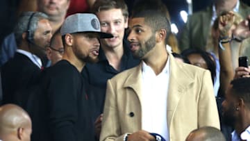 PARIS, FRANCE - AUGUST 25: NBA champions Stephen Curry of Golden State Warriors and Nicolas Batum of Charlotte Hornets attend the French Ligue 1 match between Paris Saint Germain (PSG) and AS Saint-Etienne (ASSE) at Parc des Princes on August 25, 2017 in Paris, France. (Photo by Jean Catuffe/Getty Images)