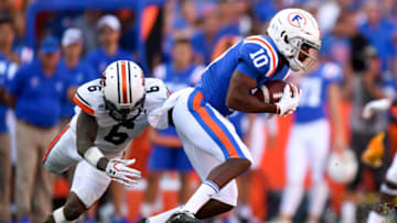 Auburn footballOct 5, 2019; Gainesville, FL, USA; Florida Gators wide receiver Josh Hammond (10) makes a reception as Auburn Tigers defensive back Christian Tutt (6) defends during the second quarter at Ben Hill Griffin Stadium. Mandatory Credit: Douglas DeFelice-USA TODAY Sports