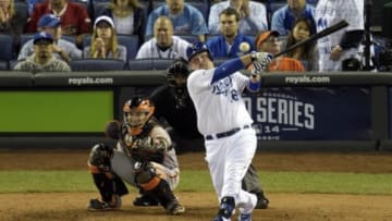 Oct 22, 2014; Kansas City, MO, USA; Kansas City Royals designated hitter Billy Butler (16) hits a RBI single against the San Francisco Giants in the sixth inning during game two of the 2014 World Series at Kauffman Stadium. Mandatory Credit: Denny Medley-USA TODAY Sports