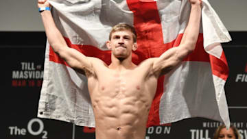 LONDON, ENGLAND - MARCH 15: Arnold Allen of United Kingdom poses on the scale during the UFC Fight Night weigh-in at The O2 on March 15, 2019 in London, England. (Photo by Jeff Bottari/Zuffa LLC/Zuffa LLC via Getty Images)