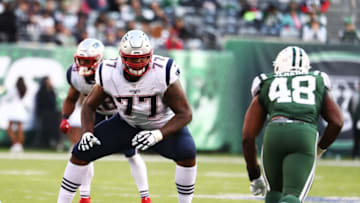 EAST RUTHERFORD, NEW JERSEY - NOVEMBER 25: Trent Brown #77 of the New England Patriots in action against the New York Jets during their game at MetLife Stadium on November 25, 2018 in East Rutherford, New Jersey. (Photo by Al Bello/Getty Images)