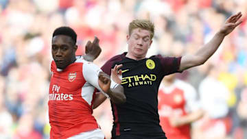 LONDON, ENGLAND - APRIL 02: Danny Welbeck of Arsenal takes on Kevin De Bruyne of Man City during the Premier League match between Arsenal and Manchester City at Emirates Stadium on April 2, 2017 in London, England. (Photo by Stuart MacFarlane/Arsenal FC via Getty Images)