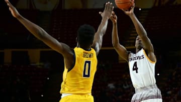 Mar 5, 2016; Tempe, AZ, USA; Arizona State Sun Devils guard Gerry Blakes (4) shoots over California Golden Bears forward Jaylen Brown (0) during the second half at Wells-Fargo Arena. The Golden Bears won 68-65. Mandatory Credit: Joe Camporeale-USA TODAY Sports
