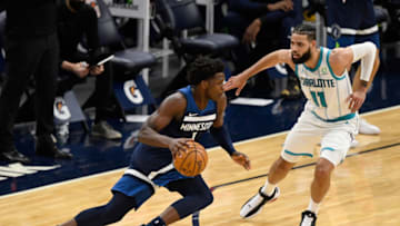 MINNEAPOLIS, MINNESOTA - MARCH 03: Anthony Edwards #1 of the Minnesota Timberwolves drives to the basket against Cody Martin #11 of the Charlotte Hornets during the second quarter of the game at Target Center on March 3, 2021 in Minneapolis, Minnesota. NOTE TO USER: User expressly acknowledges and agrees that, by downloading and or using this Photograph, user is consenting to the terms and conditions of the Getty Images License Agreement (Photo by Hannah Foslien/Getty Images)