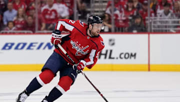 WASHINGTON, DC - APRIL 20: Evgeny Kuznetsov #92 of the Washington Capitals skates with the puck in the first period against the Carolina Hurricanes in Game Five of the Eastern Conference First Round during the 2019 NHL Stanley Cup Playoffs at Capital One Arena on April 20, 2019 in Washington, DC. (Photo by Patrick McDermott/NHLI via Getty Images)