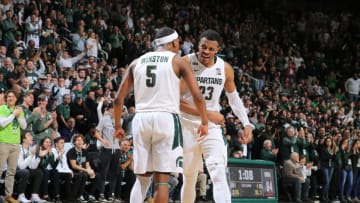 EAST LANSING, MI - FEBRUARY 25: Xavier Tillman #23 of the Michigan State Spartans celebrates with Cassius Winston #5 of the Michigan State Spartans late in the second half of the game against the Iowa Hawkeyes at the Breslin Center on February 25, 2020 in East Lansing, Michigan. (Photo by Rey Del Rio/Getty Images)