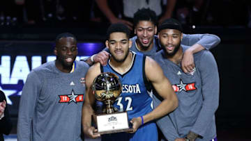 TORONTO, ON - FEBRUARY 13: Karl-Anthony Towns of the Minnesota Timberwolves poses with the trophy and Draymond Green of the Golden State Warriors, Anthony Davis of the New Orleans Pelicans and DeMarcus Cousins of the Sacramento Kings after winning in the Taco Bell Skills Challenge during NBA All-Star Weekend 2016 at Air Canada Centre on February 13, 2016 in Toronto, Canada. NOTE TO USER: User expressly acknowledges and agrees that, by downloading and/or using this Photograph, user is consenting to the terms and conditions of the Getty Images License Agreement. (Photo by Vaughn Ridley/Getty Images)