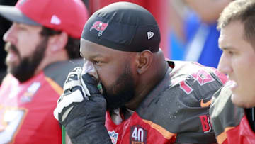 Dec 13, 2015; Tampa, FL, USA; Tampa Bay Buccaneers tackle Gosder Cherilus (78) uses an oxygen mask to help with the heat during the first half against the New Orleans Saints at Raymond James Stadium. Mandatory Credit: Kim Klement-USA TODAY Sports
