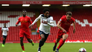 LIVERPOOL, ENGLAND - FEBRUARY 05: Kyle Walker-Peters of Tottenham Hotspur competes for the ball with Connor Randall of Liverpool during the Premier League 2 match between Liverpool and Tottenham Hotspur at Anfield on February 5, 2017 in Liverpool, England. (Photo by Jan Kruger/Getty Images)