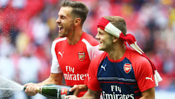 LONDON, ENGLAND - AUGUST 10: Aaron Ramsey and Jack Wilshere of Arsenal celebrate their win during the FA Community Shield match between Manchester City and Arsenal at Wembley Stadium on August 10, 2014 in London, England. (Photo by Clive Mason/Getty Images)