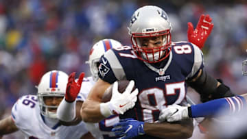 Oct 30, 2016; Orchard Park, NY, USA; The Buffalo Bills defense tries to tackle New England Patriots tight end Rob Gronkowski (87) during the second half at New Era Field. The Patriots beat the Bills 41-25. Mandatory Credit: Kevin Hoffman-USA TODAY Sports